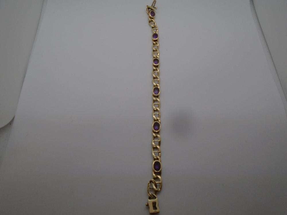 9ct yellow gold bracelet set with 6 amethyst, approx 20cm, marked 375, total weight approx 12.2g