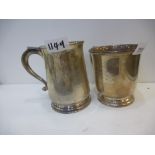 Two silver tankards of good condition one engraved and hallmarked Birmingham 1955, maker's mark