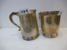 Two silver tankards of good condition one engraved and hallmarked Birmingham 1955, maker's mark