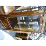 A French style pillar display cabinet, having gilt metal mounts with inlaid panel and a corner table