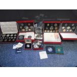 A 1937 Specimen coin set in red leather case, three proof sets and sundry coins