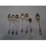 A mixture of silver spoons, four hallmarked Birmingham 1904, A J Bailey, one teaspoon 1924, possibly