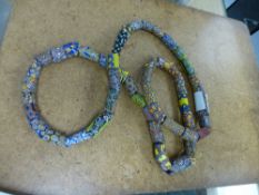 Large string of African hand painted glass beads,