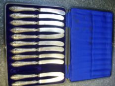 Silver cased lot of eleven silver handled knives very worn, hallmarked Sheffield 1916, George