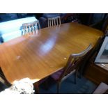 Mid Century teak extending table and set 6 teak barback dining chairs upholstered in pink fabric
