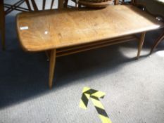 An Ercol light elm oblong coffee table, 104cms