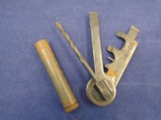 Machine Gun Stripping Tool and Oil Bottle