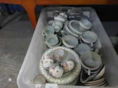 Crate of mainly Green Wedgwood embossed Queensware and German teacups