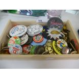 A Cigar box full of 60-70 badges