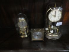 Two Schatz marriage clocks and small brass Emes mantel clock