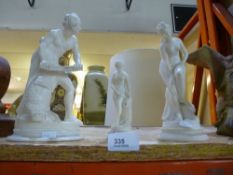 Three small carved marble statues, AF
