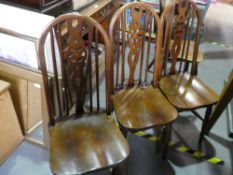 Set of six modern wheel back kitchen chairs and a pair of hoop and stick back example