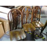 Set of six modern wheel back kitchen chairs and a pair of hoop and stick back example