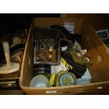 A suitcase of collectables to include Roberts radios, wooden spinning yars, boxes, tins, metal item