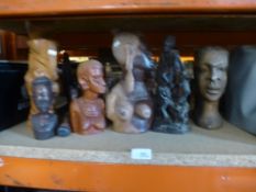 A large selection of carved African figures