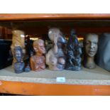 A large selection of carved African figures