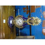 Decorative blue porcelain Marie Antionette clock with gilt decoration