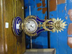 Decorative blue porcelain Marie Antionette clock with gilt decoration