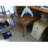 Mahogany drop flap table, pine open bookcase and bedside chest of three drawers