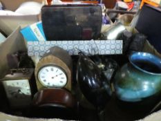 A box of sundry items to include clocks, silver plate, pottery vase, LPs, Le Creuset pots, etc