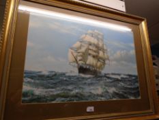 A large gilt frame picture of a sailing ship, signed M Dawson