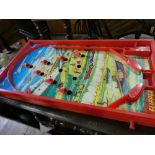 Vintage Bagatelle board and flipper Bagatelle board