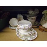 An Aynsley April Rose design tea set comprising six tea cups and saucers, cake plates, sugar bowl,