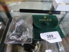 A Rolex pen and Rolex anchor, in pouch