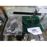 A Rolex pen and Rolex anchor, in pouch