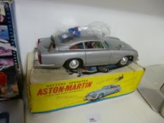 Battery operated Corgi vintage Aston Martin made car, with original box