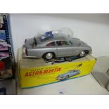 Battery operated Corgi vintage Aston Martin made car, with original box