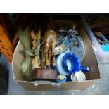 A mixed box to include wooden figures, brass figures, china and glass, etc