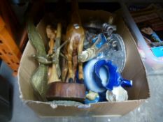 A mixed box to include wooden figures, brass figures, china and glass, etc