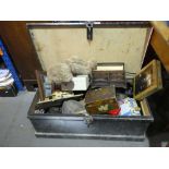 Vintage trunk containing collectables including minature chest of drawers, teddy tins, etc