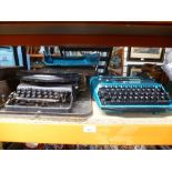 Vintage typewriters,one marked 'The Emperor' and the other 'Smith Corona'