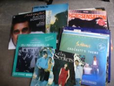 A quantity of vinyl LPs to include Barry Manilow, The Manhattan Transfer, Donna Summer, The Seekers