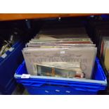 Two large crates of vintage country LPs, and singles, from the 60s and 70s
