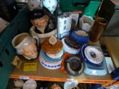 A quantity of Breweryana to include water jug, ashtrays, and Royal Doulton toby jugs