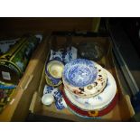 A box of china items to include blue and white egg cups, bowls, china plates and a box of vintage