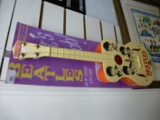 A vintage child 'Selcoi Beatles' new sand guitar