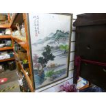 An oriental silk picture depicting a river scene, signed