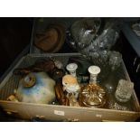 A vintage suitcase containing mixed items to include Mei-lin candlesticks, Royal Doulton animal