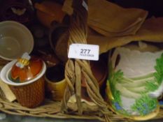 Two baskets of honey pots and Bee related items