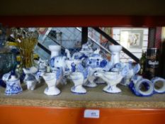 A quantity of blue and white ornaments to include Delft egg cups, teapots in the form of