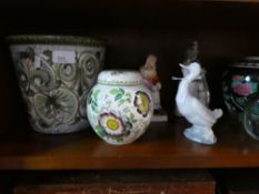 Two shelves of china, glass and pottery ornaments, to include Masons Ginger jar, Nao figures, etc