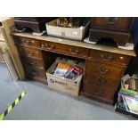 Vintage oak pedestal desk with green leather top above 9 drawers