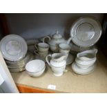 A part Royal Doulton 'White Nile' tableware to include teapot, milk jug, plates, etc