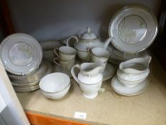 A part Royal Doulton 'White Nile' tableware to include teapot, milk jug, plates, etc