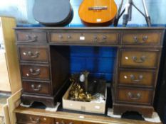 Vintage mahogany pedestal desk, with brown tooled leather above 9 drawers