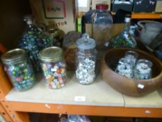 A quantity of marbles, in jars and to include vintage treen items